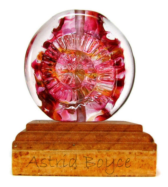Pink Explosion Ammonite Artisan Lampwork Focal Bead -Blended shades of pinks and pale oranges w/raised ammonite design for wonderful sparkle