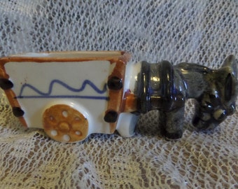 Vintage ceramic donkey with cart with The Truman's on side of cart