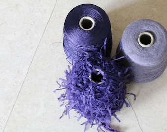 Set of three luxury Italian fancy yarns.Yarns on cone,knitting yarns,weaving yarns,fibre,textile wool,fancy yarns,purple yarns,crochet yarns