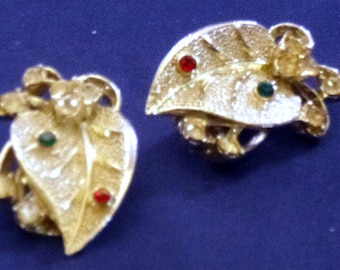 Vintage Silver Tone Leaf Clip On Earrings with Clear, Red, & Green Rhinestones, 1980s