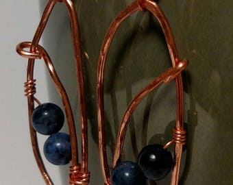 Copper wire earrings with blue stone accents