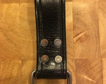 Tape measure holder with new and improved design - 4 rivets