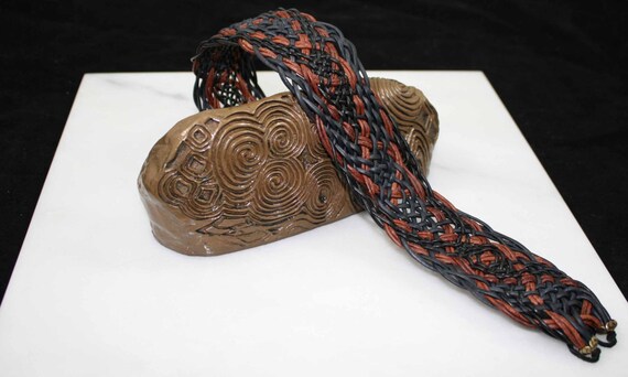 Leather Celtic necklace in blacks, blues, and browns