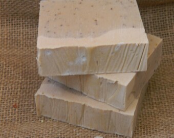Frosted Cranberry Goats Milk Soap with blueberry seeds