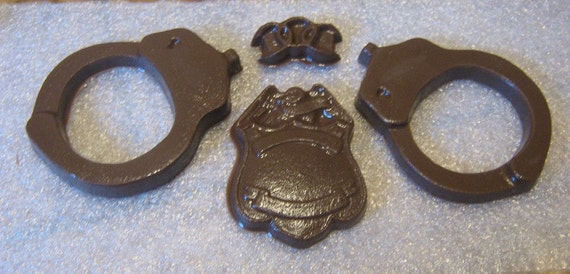 Chocolate handcuffs, chain, and police badge party favor