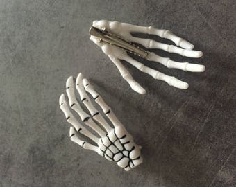 clips in the shapes of skeleton hand hair