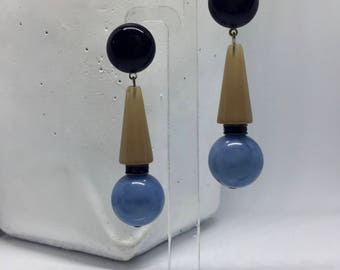 Earrings in beige, light blue and black resin with black crystals