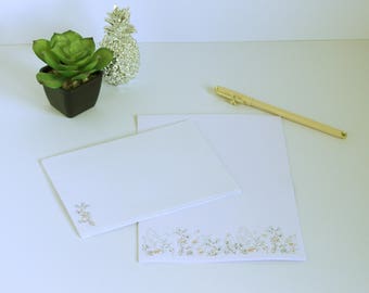 Floral border stationery set.