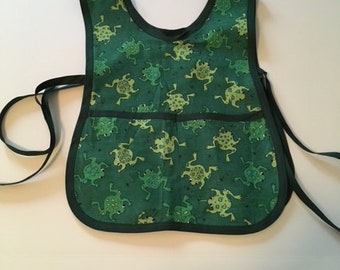 Child's smock apron with frog theme