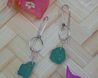 Blue bonfire seaglass earrings hung on sterling silver
