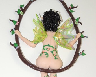 Fairy back on a flowering branch