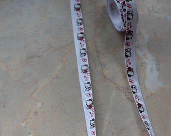 White Ribbon with a little cat holding a heart. 10 mm