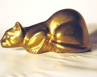 Brass crouching cat doorstop