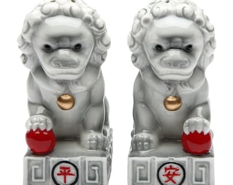 A Pair of Stone Lions with Chinese Characters Matching Salt & Pepper Shakers