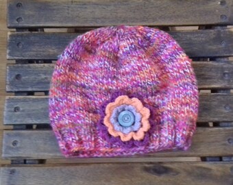 girl's beiney with a matching flower