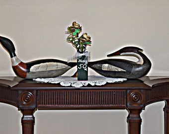 artificial flowers with bud vase