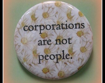 2 1/4" pinback button Sorry but they are not...