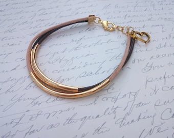 Leather wrap bracelet with gold tubes