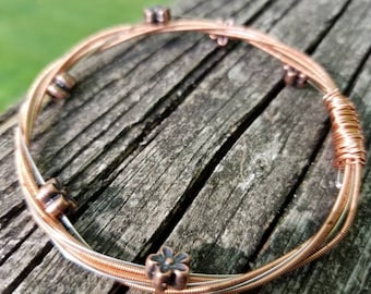 Recycled guitar string bracelet