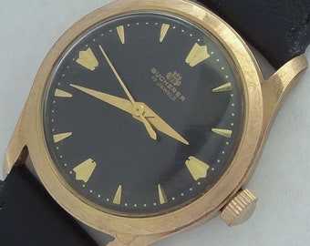 17 Jewels Swiss made Bucherer Men's vintage watch gold filled 20 Microns very rare black dial.
