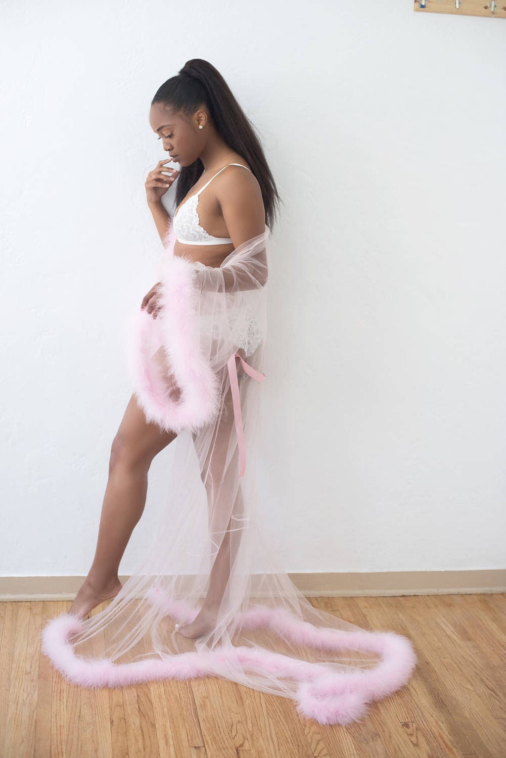 pink sheer pants with fur trim