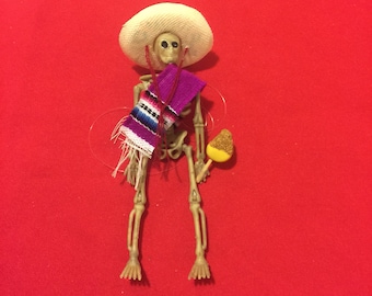 Pink Sarape day of the dead skeleton ornament with a mango #12