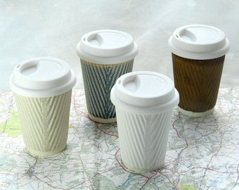 Ceramic travel mug with Silicone rubber lid (no sleeve). Coffee cup and tea cup. Travel mug or travel cup. Eco, re use, recycle. Coffee mug.