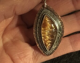 Cat’s Eye Fachado Rutilated Quartz Pendant