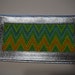 Leather checkbook cover in bright silver with bargello insert