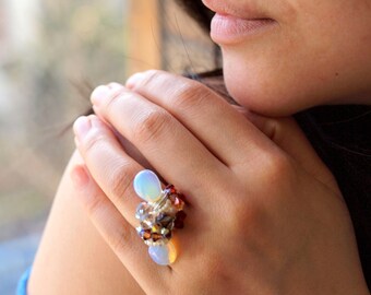 Twin opal cocktail ring wirewrapped in sterling silver sculpture band