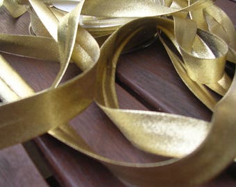 Gold Lurex bias by the yard