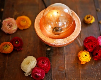 Concrete and copper or gold bulb Edison lamp