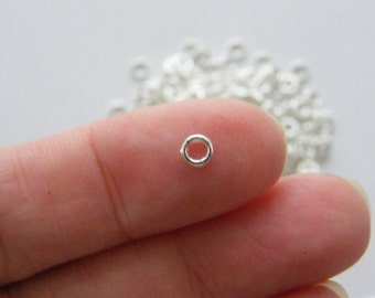 BULK 500 Spacer beads closed jump rings 4mm silver plated FS98