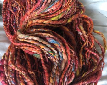 handspun art yarn merino pinks orange