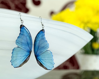 Blue morpho butterfly wing earrings looks like real butterfly. Comes in a gift box.