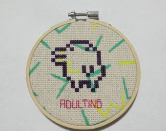 Tamagotchi, 90s cross stitch