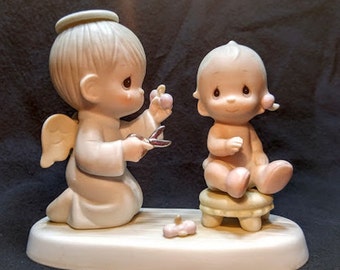 Precious Moments Figurine "Baby's First Haircut"