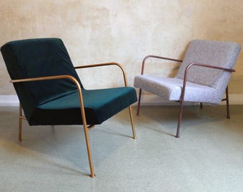 Green velvet cozy armchair with bronze metal frame