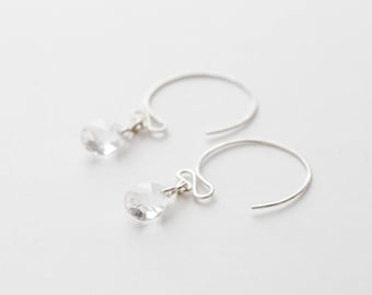 Small swirly circular stering silver hoop earrings with white Swarovsky crystals