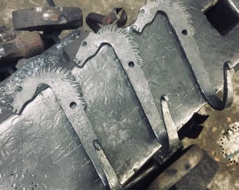 Hand forged horse hooks