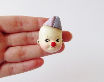 Cutie the Kewpie Clown - Paperclay Doll Face Pin