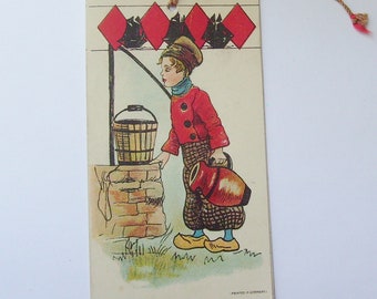 Antique Germany bridge tally card Dutch boy fetching water from well bookmark style scorecard ephemera