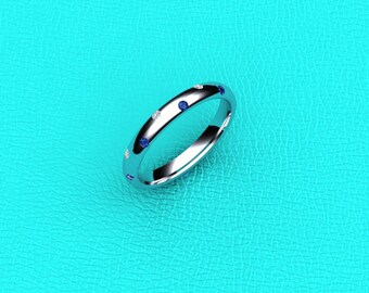 14K white gold flush set Sapphire and Diamond band