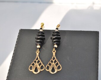 Art Nouveau black and gold dangle earrings.