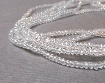 Sparkly Clear Glass Rondelles. Faceted Crystal Rondelles. Clear. 1.5mm-2mm. Full Strand. One (1).