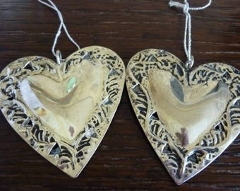 2 metal hanging heart