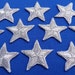 Pack of 10 Silver star patches > iron-on or sew-on > very pretty!