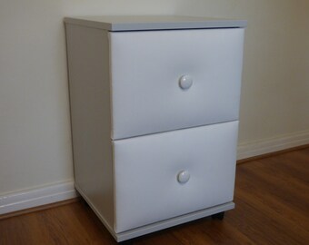 Nightstand/bed side cabinet with upholstered drawers