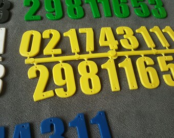 17 yellow number plastic figures for marking to be screwed or craft