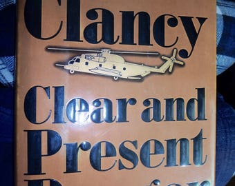 Clear and Present danger- tom Clancy-ist edition 1-10 number code with DJ-1989